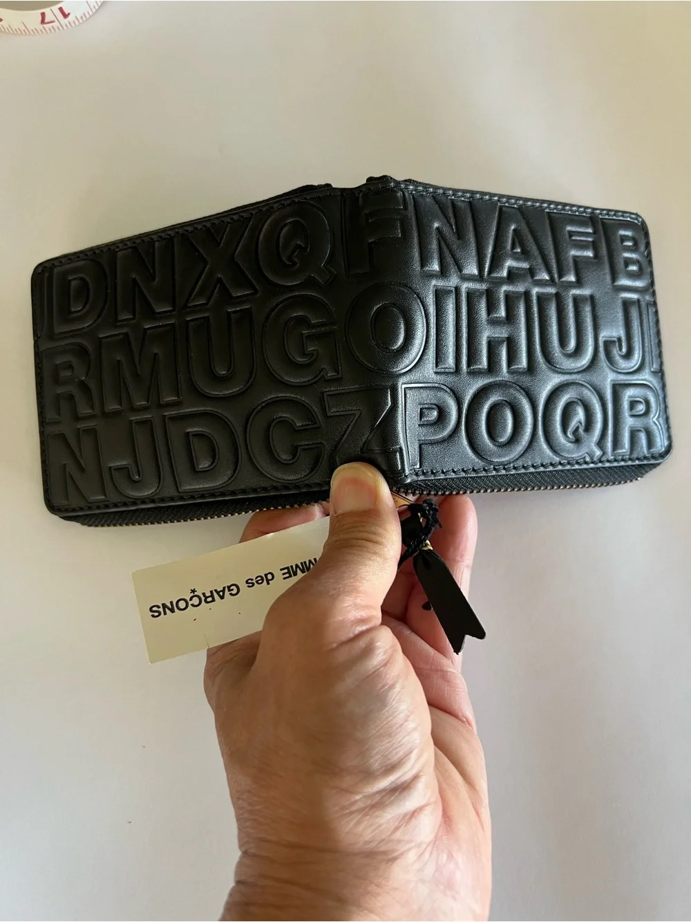 New Comme des Garcons Embossed Leather Zip Wallet